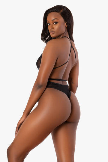 Body de malla negra con escote pronunciado